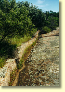 ioneering farmers such as the Kwaterski family constructed gutters to channel water runoff from Pildappa Rock.